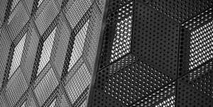 Dark abstract texture of the building wall facade panels